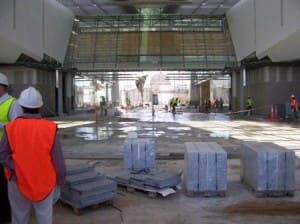 Thousands of marble floor tiles are being laid in the Atrium.